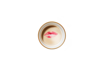 Morning Ritual: A Coffee Cup Confesses Secrets of a Late Night with a Kiss Goodbye and a Sprinkle of Sugar.