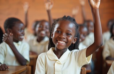 Fototapeta na wymiar Cheerful African girl in school uniform with hand up, smiles in class. Other kids in background, happy learning. Education concept, elementary school, participation, answering questions, classwork.