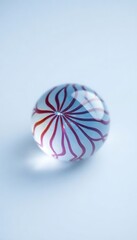close up of a glass object on a white surface