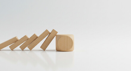 Wooden blocks falling domino effect concept minimalist design clean white background
