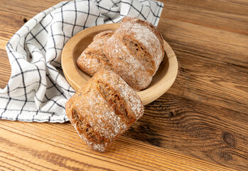 Brown rye bun, square gluten free bread, whole grain healthy breakfast bread