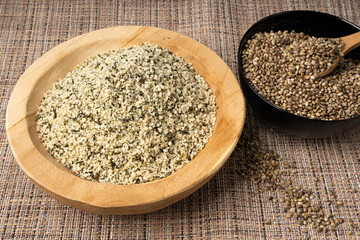 Shelled hemp seeds pile, peeled cannabis grains, marijuana kernels without peel
