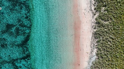 Pink beach and ocean drone shot Komodo National Park Flores Indonesia