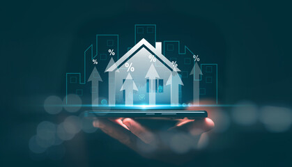 Real estate investment concept, Businessman holding smartphone with percentage of bank interest...