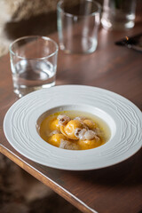Savory gourmet dish with delicate flavors and textures showcasing culinary artistry and presentation concept