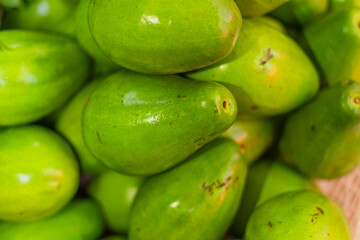 Green avocado pile for sale