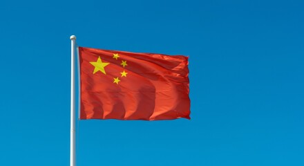 Photograph of an china flag on a blue background 
