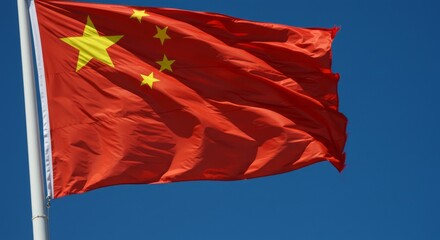 Photograph of an china flag on a blue background 