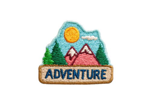 Embroidered patch with mountain landscape, trees, sun, and the word 'Adventure'. Isolated on transparent background.