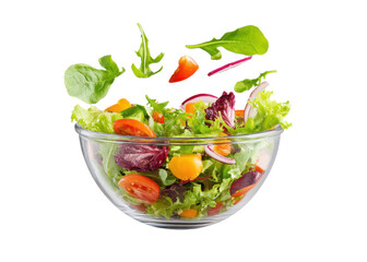 Fresh salad with flying vegetables in a glass bowl on a transparent background. Concept of healthy eating, diet, and vegetarian food.