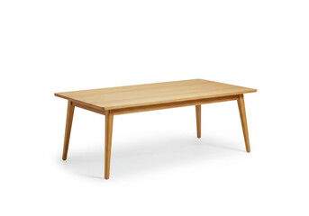 Wooden table with neatly arranged art supplies - paint brushes, tubes of paint, and a sketchbook. White background enhances vibrant colors.