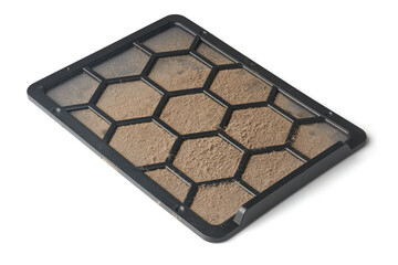 clogged removable or built in screen air filter of computer case isolated white background, fine...
