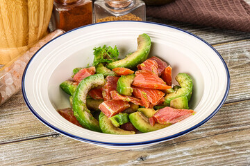 Salad with avocado and salmon