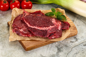 Raw beef cheeks cut for cooking