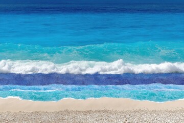 Ocean waves on sandy beach
