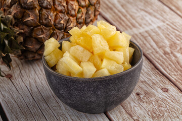 Sweet canned pineapple fruit pieces