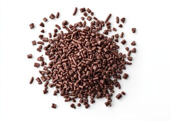 Dark chocolate sprinkles scattered on a white background