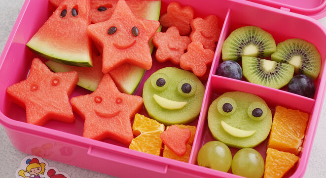 Healthy school lunch box ideas with watermelon stars and kiwi fruit smiles food