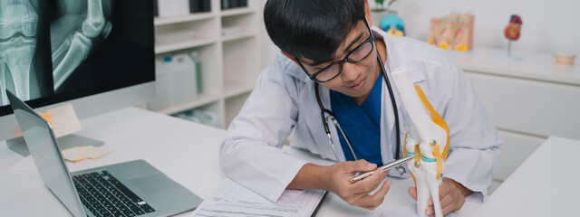 banner background of the doctor devised a treatment plan for the patient suffering from joint pain,...