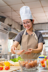 Chef preparing food ingredients  in Professional Kitchen