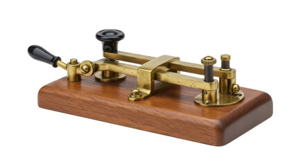 A close up of a vintage morse code key on a wooden base with brass components and black handles