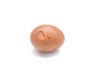 Cracked chicken egg isolated on white background 