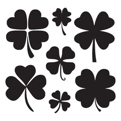 A set of black leaf clover silhouettes on a white background 