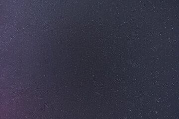 Deep night sky dotted with countless bright stars and constellations, showcasing the vastness of...