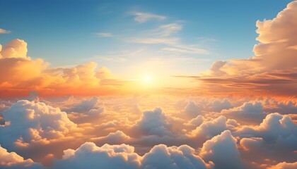 Beautiful sunset scene showing a vast sky filled with soft fluffy clouds illuminated by warm orange and pink sunlight, creating a peaceful and glowing atmosphere above the horizon