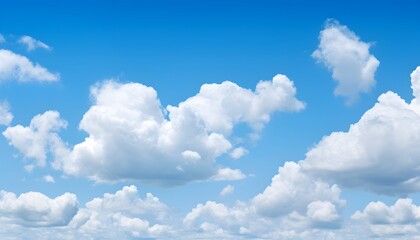 Clear blue sky filled with soft, fluffy white clouds floating gently, creating a bright and peaceful atmosphere on a sunny day with natural daylight