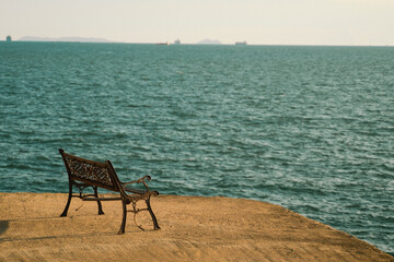 The island glowed beneath the summer sky as the sun set over the ocean, painting the seascape in...