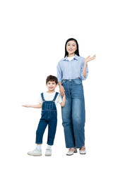 Full body image of Asian mother and boy  posing on the background