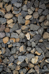 The texture of the rocks neatly arranged underneath looks very attractive for outdoor decoration