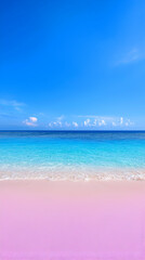 Obraz premium Pink Sand Beach and Turquoise Ocean Under a Vivid Blue Sky