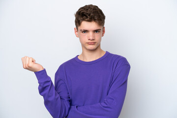 Teenager Russian man isolated on white background having doubts