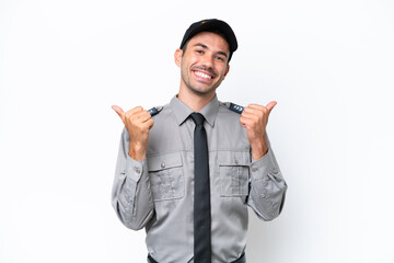 Young safeguard man over isolated white background with thumbs up gesture and smiling