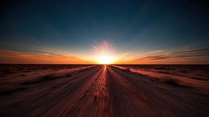 Naklejka premium Firework Displays Concept. Vast Desert Road Leading to Stunning Sunset Over Horizon with Colorful Sky and Rays of Light