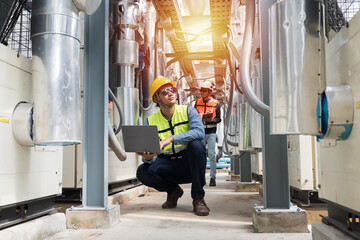 Utilities, Building utilities. Network of utilities on rooftop of building. Group of engineer worker inspecting quality of utilities system in sewer pipes area at construction site