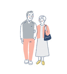 並んで歩いている笑顔のシニアカップル