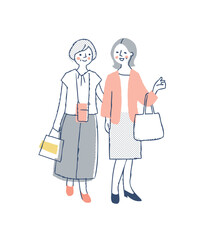 250421_1p笑顔で一緒に歩く中年・シニア女性2人