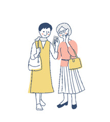 笑顔で一緒にスマホを見ている中年女性2人