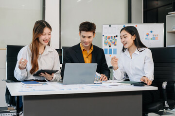 Asian business team collaboration, office project review or strategy meeting.
