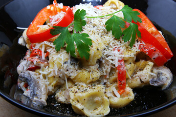 Italian Tortellini Pasta with mushrooms and cream food