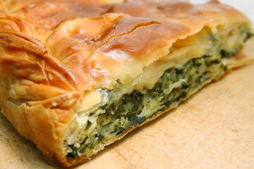 Spinach pie handmade with cheese and olive oil