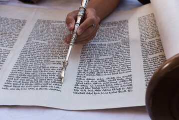 Closeup of a yad or pointer to guide the Torah reader through the Hebrew text.