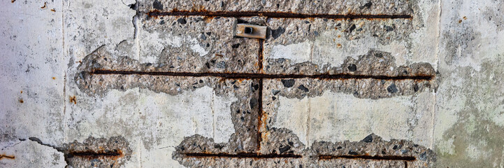 Panoramic image. Surface of an old concrete wall after long erosion