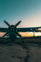 Abandoned aircraft field wirn AN-2 on it