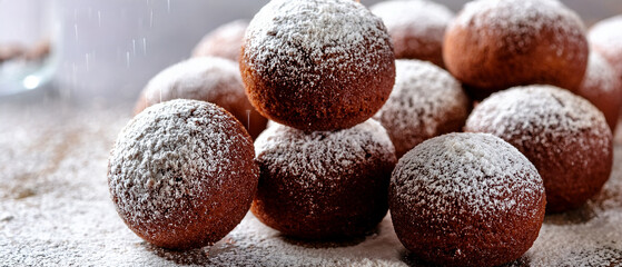 Brown sweet acorns, a tasty snack, sit on the delicious wooden surface