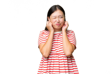 Young Asian woman over isolated background is a little bit nervous