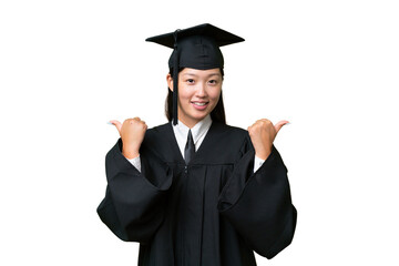 Young university graduate Asian woman over isolated background with thumbs up gesture and smiling